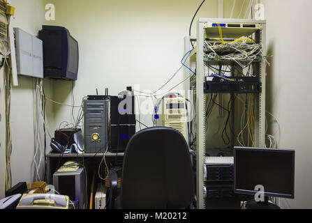 The empty workplace of the system administrator. The programmer develops software. Stock Photo