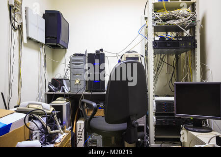The empty workplace of the system administrator. The programmer develops software. Stock Photo