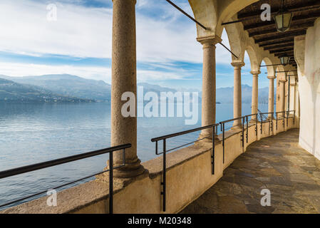Colonnade of an ancient hermitage. Lake Maggiore from Hermitage of Santa Caterina del Sasso (XIII century), Italy Stock Photo