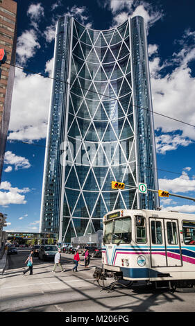 The Bow, Calgary tallest office tower, Light Rapid Transit train, also known as C-Train, at 7 Ave SW in downtown Calgary, Alberta, Canada Stock Photo