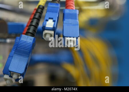 Optic fiber cables with SC type connectors close-up Stock Photo