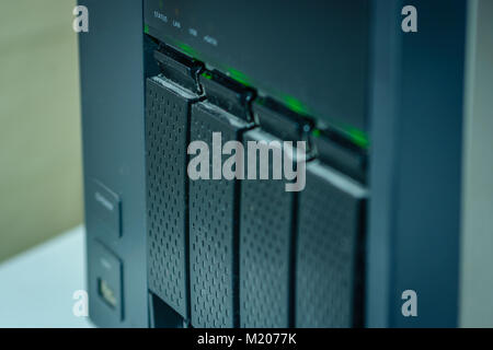NAS System with four Hard-Drives for Home and Business Use Stock Photo