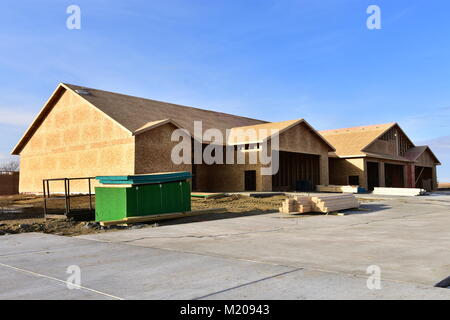 Wood frame residential building under construction. Stock Photo