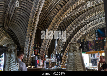 View of the interior of the HR Giger Bar in the small Castle Village of Gruyeres. This artist was famous for blockbuster movies such as Alien Stock Photo
