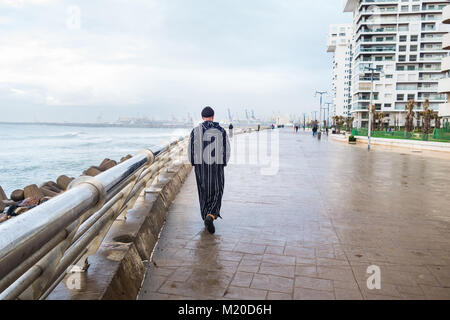 Casablanca, Morocco - 14 January 2018 : local man walking Hassan ii walk alley Stock Photo