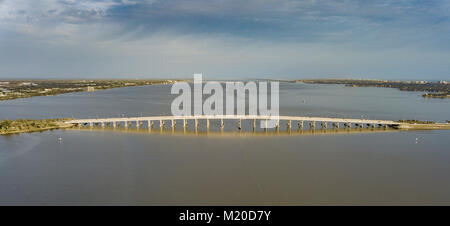 This bridge connectiosn downtown Melbourne on the mainland with the barrier island and beaches Stock Photo