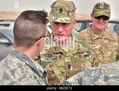 Command Sgt. Maj. William Thetford, U.S. Central Command’s senior enlisted leader, talks with Airmen Jan. 23, 2018, during a tour of the 386th Air Expeditionary Wing at an undisclosed location in Southwest Asia. (U.S. Air Force Stock Photo