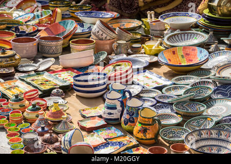 hand-painted dishes of a multitude of colors in a traditional art market Stock Photo