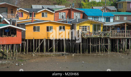 Colorful houses on stilts on Chiloe Island in Chile Stock Photo