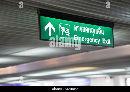 Emergency Exit in the building Green exit sign Stock Photo