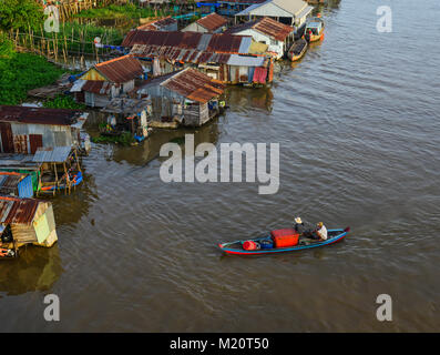 Chau Doc, Vietnam - Sep 3, 2017. A wooden boat with floating houses in Chau Doc, Vietnam. Chau Doc is a city in the heart of the Mekong Delta, in Viet Stock Photo