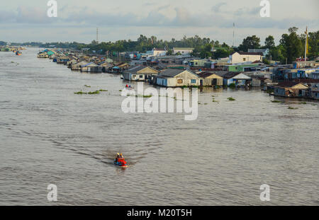 Chau Doc, Vietnam - Sep 3, 2017. Floating houses with boat on river in Chau Doc, Vietnam. Chau Doc is a city in the heart of the Mekong Delta, in Viet Stock Photo