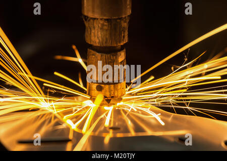 Close up spot machine is welding nut to automotive part Stock Photo