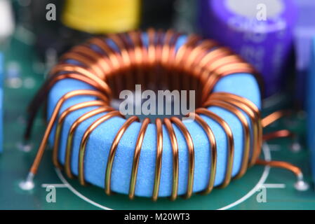 Inductor copper coil on circuit board Stock Photo - Alamy