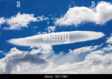 Puffy clouds against an azure blue Antarctica sky Stock Photo