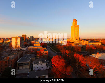 The sun sets over the State Capital Building in Lincoln Nebraska Stock Photo