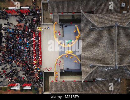 Shengzhou, China, 3rd Feb, 2018. Villagers view dragon and lion dance during a fair in Dongwang Village, Shengzhou City, east China's Zhejiang Province, Feb. 3, 2018, to greet the upcoming Spring Festival, or Chinese Lunar New Year. Credit: Weng Xinyang/Xinhua/Alamy Live News Stock Photo