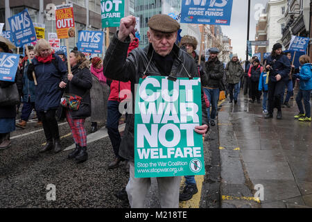 London, UK. 3 February 2018. Thousands of National Health Service workers, union members, activists and supporters march in central London in protest against government cuts in the state health service and the privatisation of medical care. Credit: mark phillips/Alamy Live News Stock Photo