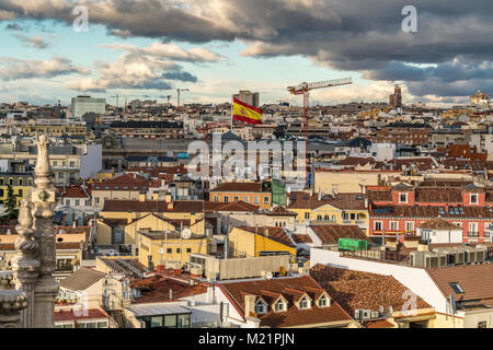 Madrid skyline sunset view from Cibeles Palace Townhall, Madrid City Council building, big spanish flag on Archaeological Museum and National Library Stock Photo