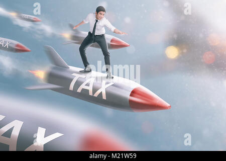 Handsome asian businessman flying on tax rocket. Taxation concept Stock Photo