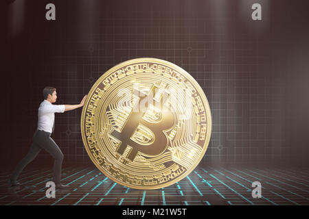 Image of asian business man pushing bitcoin Stock Photo