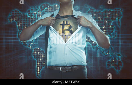 Businessman superhero with bitcoin on his chest over digital world map background Stock Photo