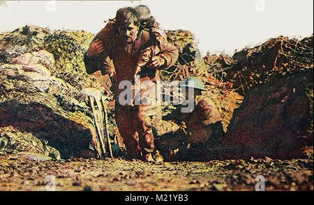 First World War (1914-1918)  aka The Great War or World War One - Trench Warfare   -A  British soldier rescuing a wounded colleague - from a printed photograph of the time Stock Photo