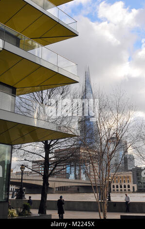 a different or unusual viewpoint or view of the shard office building or tower in central london near number one london bridge 1. modern architecture. Stock Photo