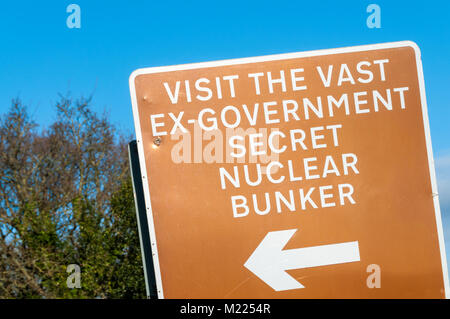A brown tourist attraction sign for the Kelvedon Hatch Secret Nuclear Bunker in Essex