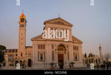 Arenzano Italy   December  29, 2017: 'Basilica Gesù Bambino di Praga' ( Infant Jesus of Prague or Child of Prague), people walk on the square in front Stock Photo