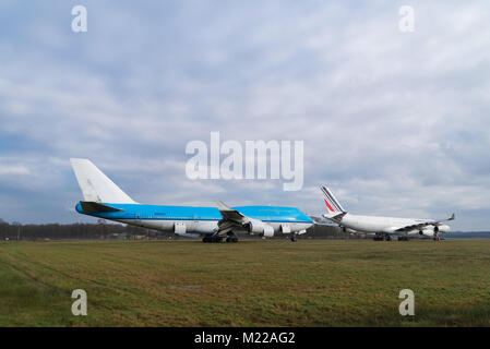 ENSCHEDE, NETHERLANDS - FEBRUARY 3, 2018: Two commercial passenger airplanes to be dismantled on a former military airfield Stock Photo