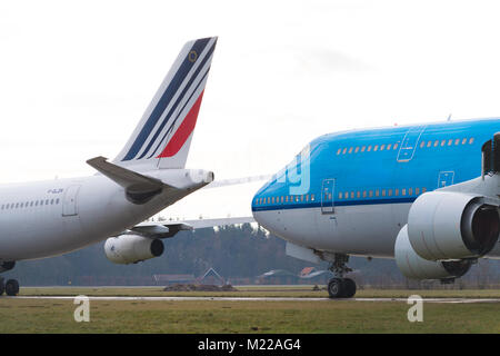 ENSCHEDE, NETHERLANDS - FEBRUARY 3, 2018: Two commercial passenger airplanes to be dismantled on a former military airfield Stock Photo