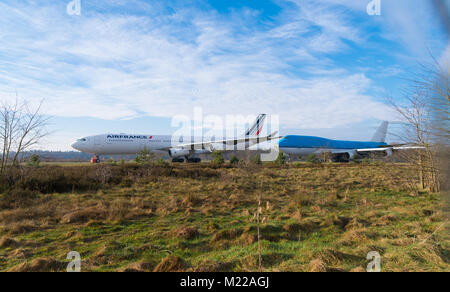 ENSCHEDE, NETHERLANDS - FEBRUARY 3, 2018: Two commercial passenger airplanes to be dismantled on a former military airfield Stock Photo