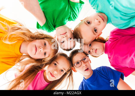 Kids faces in a round Stock Photo