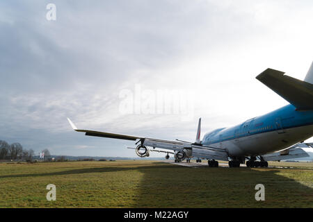 ENSCHEDE, NETHERLANDS - FEBRUARY 3, 2018: Two commercial passenger airplanes to be dismantled on a former military airfield Stock Photo