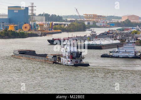 Houston, Texas - The tugboat Joe B. Ward pushes a barge loaded with coal in the Houston Ship Channel. Stock Photo