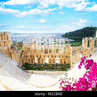 cup of Herodes Atticus amphitheater of Acropolis, Athens, Greece with flowers Stock Photo