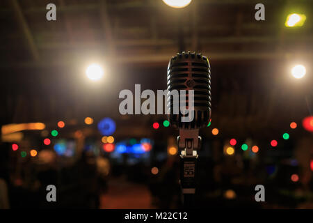 Retro microphone on stage in a pub Stock Photo
