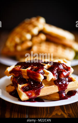 Waffles With Strawberry Jam And Cream Stock Photo - Alamy