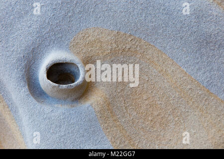 Stone texture of brawn and grey blue rock - background Stock Photo