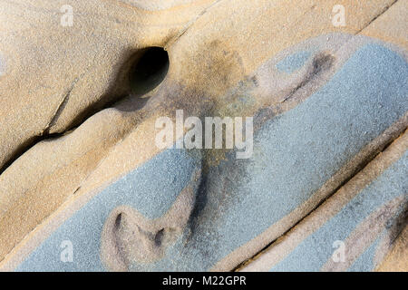 Stone texture background - Hole and diagonal stone texture of brawn and grey blue rock Stock Photo