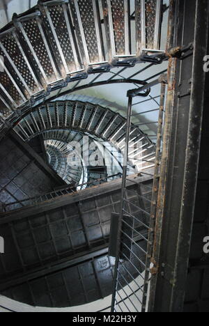 A spiral staircase inside a lighthouse from the bottom looking up. Stock Photo