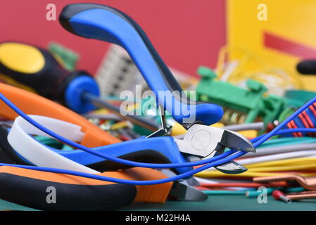 Tools and component used in electrical installations Stock Photo