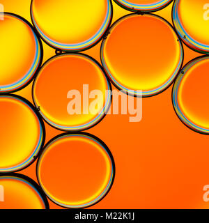 Abstract image of oil droplets  in water with colorful background. Stock Photo
