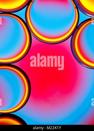 Abstract image of oil droplets  in water with colorful background. Stock Photo