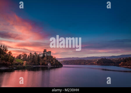Stunning dusk over castle by the lake, Poland Stock Photo