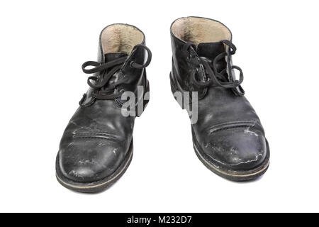 Winter men's shoes with a protruding salt Stock Photo - Alamy