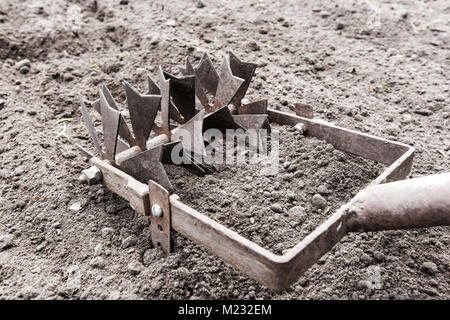 manual plow on the ground Stock Photo