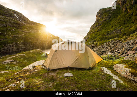 tourist tent in mountains summertime sunset Norway Stock Photo