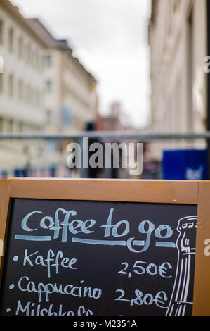 Coffee To Go sign outside a cafe Karlsruhe Baden-Württemberg Germany Stock Photo